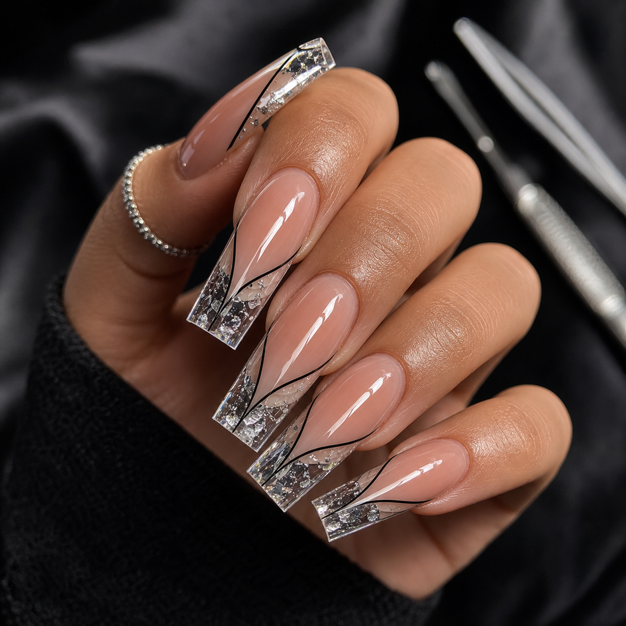 Fairy grunge nail art with sheer pink, iridescent glitter, and pressed daisy details